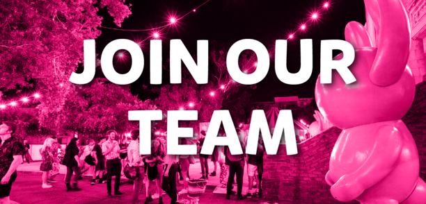 Pink overlayed image text: Festival Positions Available 